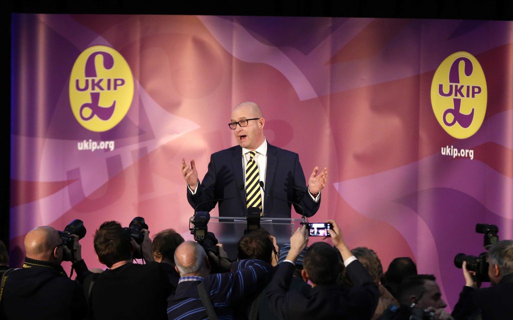 Paul Nuttall gestures after being announced as the new leader of the U.K. Independence Party in London Monday Nov. 28, 2016. (AP Photo/Alastair Grant)