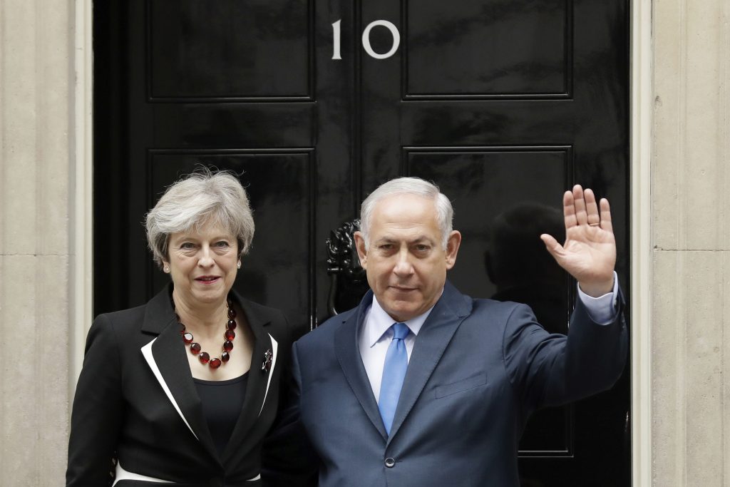 British Prime Minister Theresa May and Israeli Prime Minister Benjamin Netanyahu pose for the media as Netanyahu arrives for their meeting at 10 Downing Street in London, Thursday, Nov. 2, 2017.