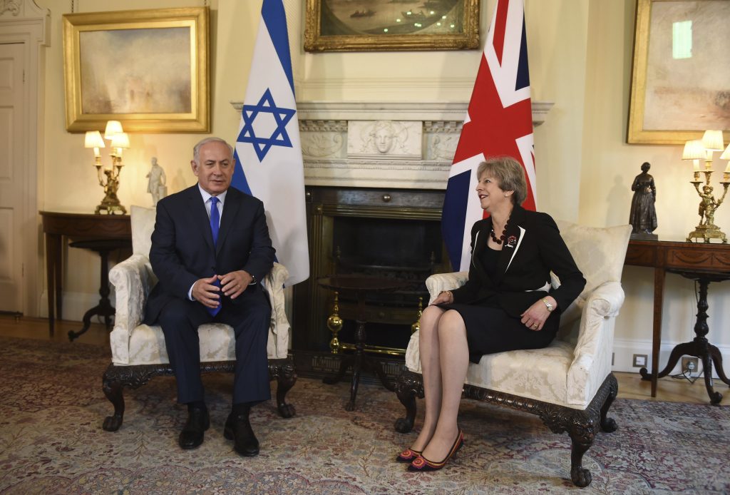 British Prime Minister Theresa May speaks with Israeli Prime Minister Benjamin Netanyahu at a meeting in 10 Downing St, London, Thursday, Nov. 2, 2017. The visit marks a century since the Balfour Declaration, Britain's promise to Zionists to create a Jewish home in what is now Israel.