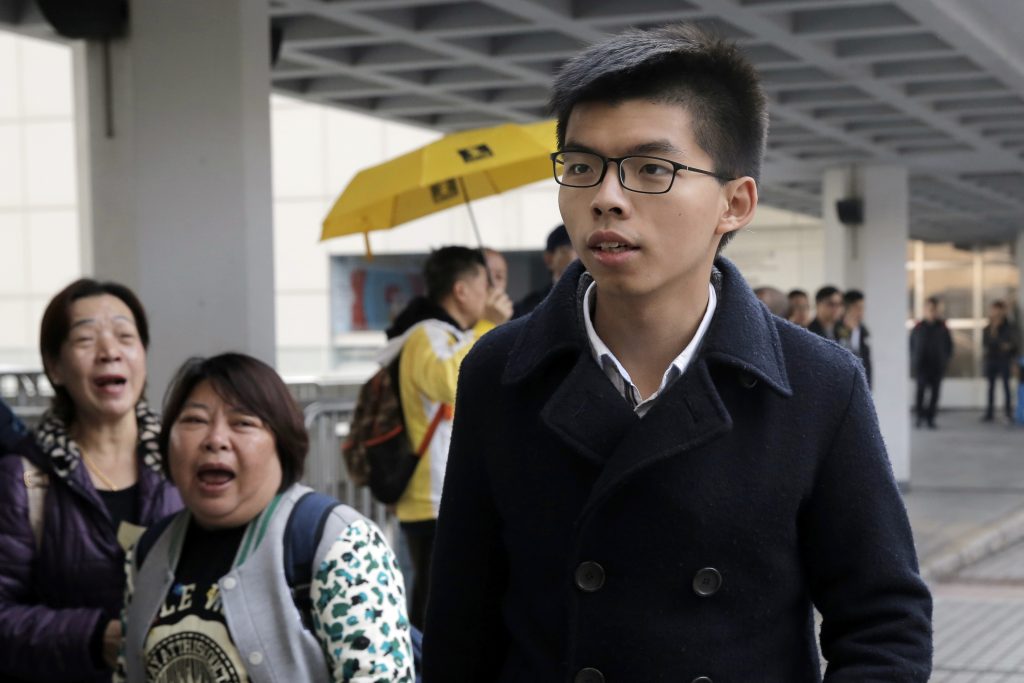 The 21-year-old pro-democracy young activist Joshua Wong called for May to raise Hong Kong issues. (AP Photo/Kin Cheung)