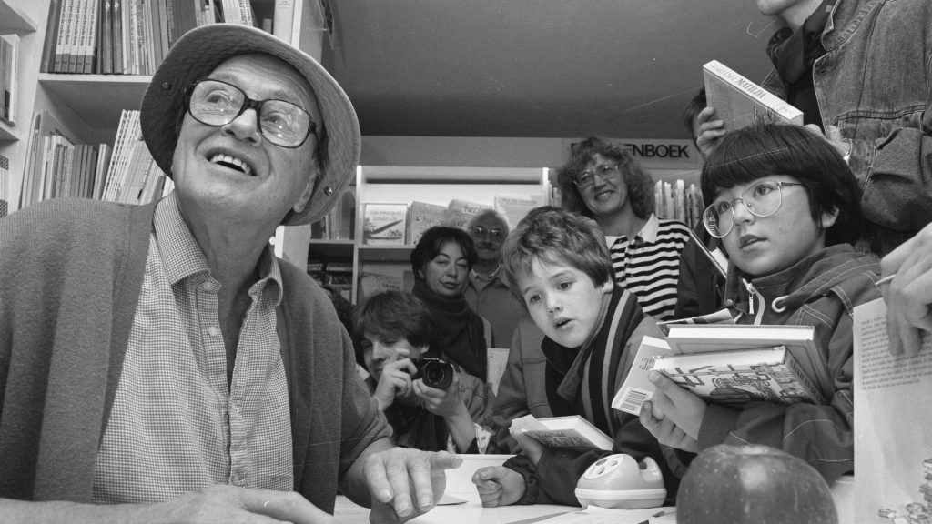 Roald Dahl signs books in the Children's Bookshop in Amsterdam,